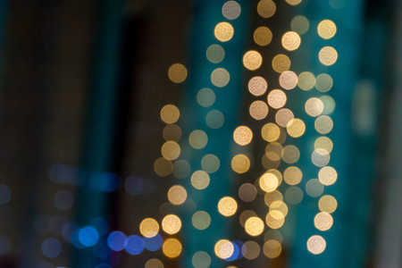Soft glowing dots made from out-of-focus lights, this looks cozy and festive against green and brown...