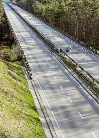Highway running through the middle of the forest in Gdynia, Polandの写真素材