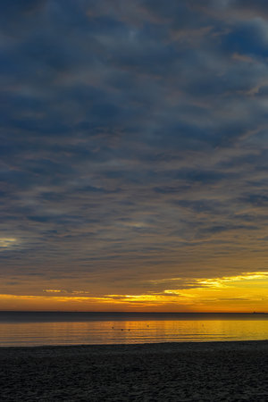 Beautiful sunrise on the beach in Gdynia, Polandの写真素材
