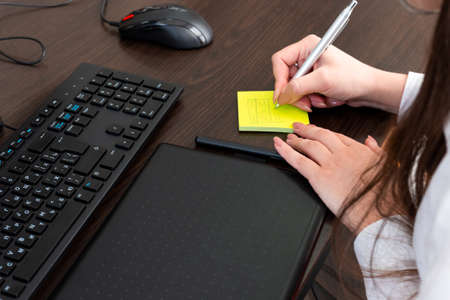 Designer writes notes, workflowの写真素材
