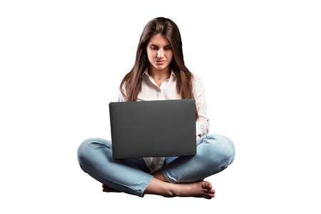 girl works at a laptopの写真素材