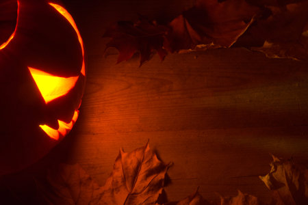 Spooky halloween dark red background with jack o lantern