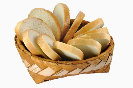 Braided birch-bark bread box with white bread isolated over white background