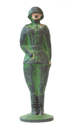 Retro metal toy soldier isolated on whiteの写真素材