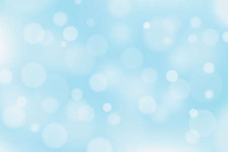 Abstract blue and white background with bokeh effect. Christmas defocused circle lightsの写真素材
