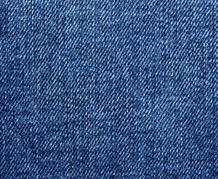 Blue jeans texture closeup, denim backgroundの写真素材