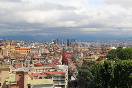 White clouds over Naples city Italy city panoramaの写真素材
