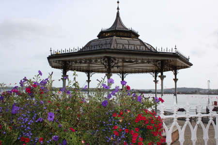 Seaside Pavillion with flowers in the front of the cameraの写真素材