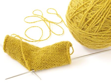 clew of the wool threads and knitting pattern                               の写真素材