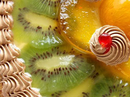 cake fragment with cream and fruits in jelly                               の写真素材