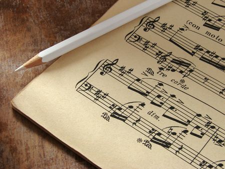sheet of musical symbols with pencil                               の写真素材