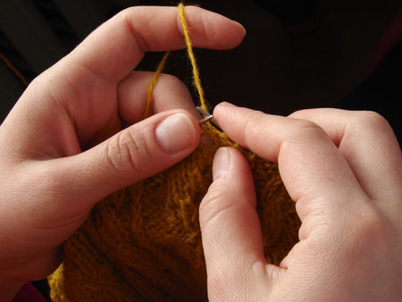 woman hands with knitting                               