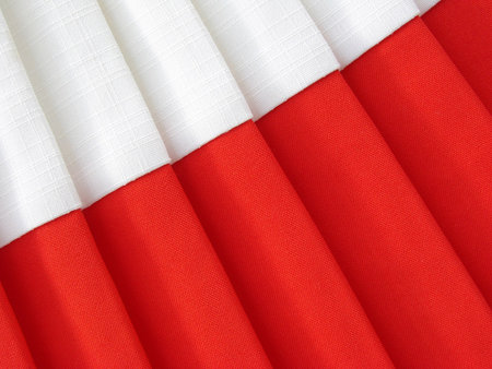 red and white abstract folded fabric background                               