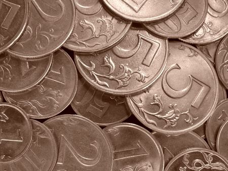 sepia toned abstract coins background                               の写真素材