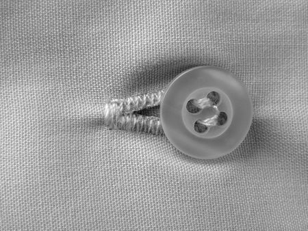 shirt fragment with button closeup                               の写真素材