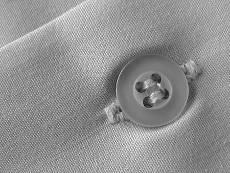 shirt fragment with button closeup                               の写真素材