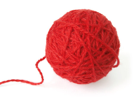 red wool yarn skein on white                                