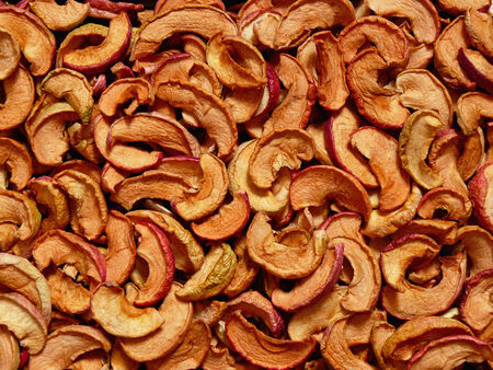 dried apple slices as food backgroundの写真素材