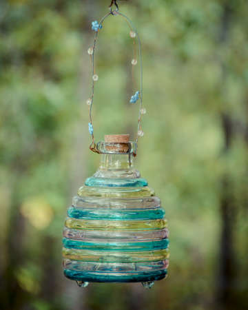 Winter bottle against green fieldの写真素材