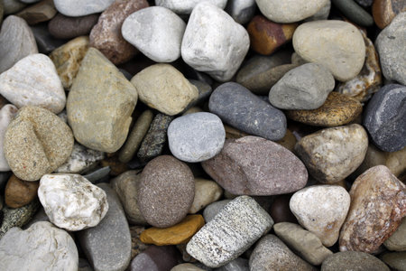 Closeup of a variety of river rocks 