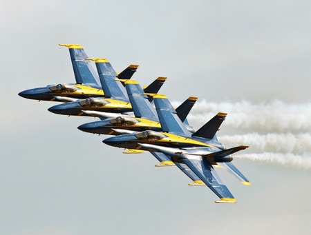 FLORIDA, USA - NOVEMBER 6: Blue Angels fly in formation during performance on "Wings Over Homestead" on November 6 2010 at Homestead, Fl. USA. This event takes place at the Homestead Air Force Baseのeditorial素材