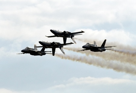 FLORIDA, USA - NOVEMBER 6: Silhouetted Blue Angels fly in formation during performance on "Wings Over Homestead" on November 6 2010 at Homestead, Fl. USA. This event takes place at the Homestead Air Force Baseのeditorial素材