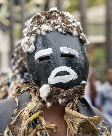 SANTO DOMINGO, DOMINICAN REPUBLIC - MARCH 2  Unidentified man wearing a sorcerer mask at the public annual  Carnival in the Malecon streets on March 2, 2014 in Santo Domingo, Dominican Republic   のeditorial素材