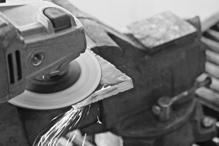 sparks fly from and angle grinder- black and whiteの写真素材