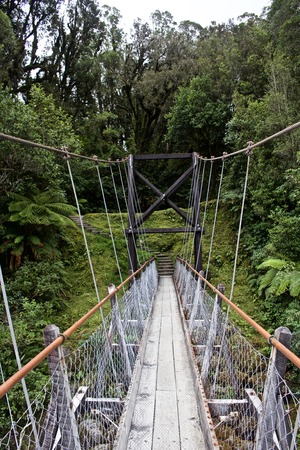 Suspension Bridge over River in New Zealandの写真素材