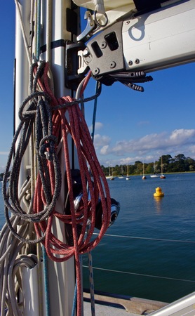 Coiled lines at base of mast of sailboatの写真素材