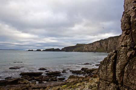 Scenic Rocky Irish Coastline with calm seasの写真素材
