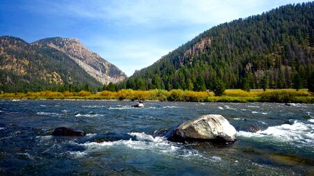 Scenic Riverside View From the Madison RIver in Autumn in Montanaの写真素材