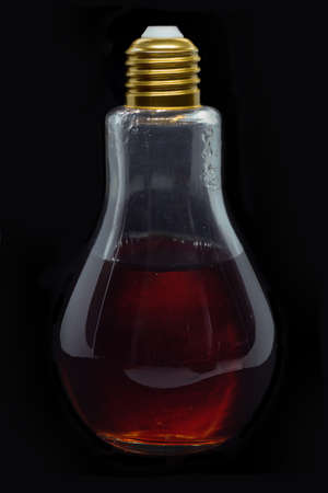 Bulb glass with black tea insideのeditorial素材