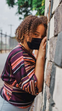 Young girl takes to the streets after finishing quarantineの写真素材