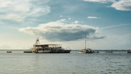 Pirate ship sailing in the sea towards the horizonの写真素材