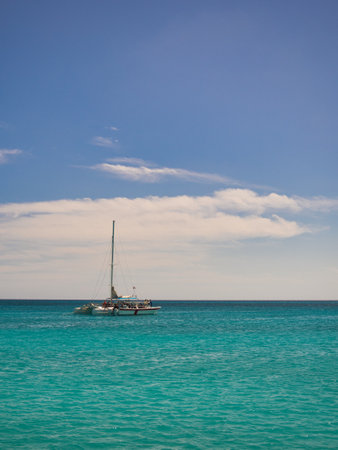 boats sailing in the sea towards the horizonの写真素材