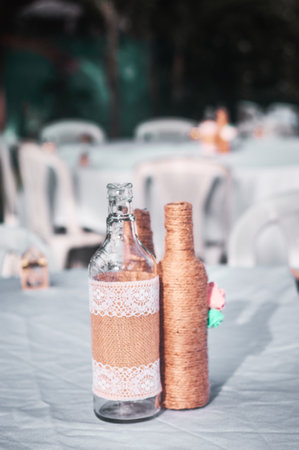 Wedding bottles on the table. Wedding decoration in Montenegroの写真素材