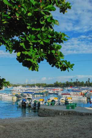 View of the beach with yachts and boats in the background.の写真素材