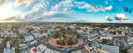 Aerial view of a small village in the mountains at sunset.の写真素材