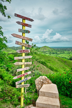 wooden signpost on the hillside, beautiful photo digital pictureの写真素材