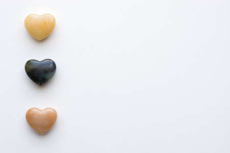 3 agate hearts shot on a white background with room for textの写真素材