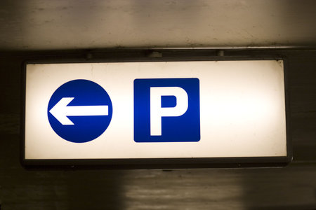 A parking sign in an underground car park