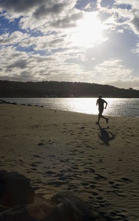 Jogging on the Beachの写真素材