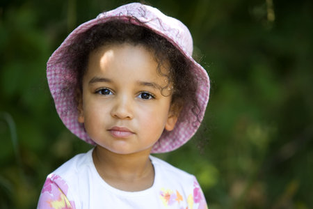A cute little mixed race girl