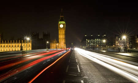 Night time shot of Westminster Bridge, London, England showing Big Ben and the Houses of Parliamentの写真素材