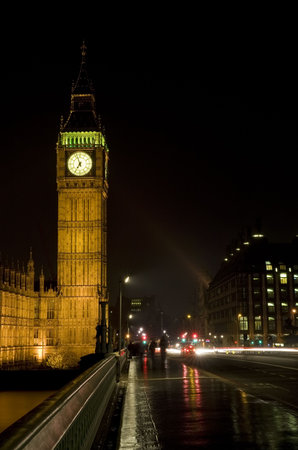Big Ben, London, England shot at night across Westminster Bridge