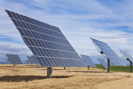 A field of photovoltaic solar panels providing alternative green energyの写真素材