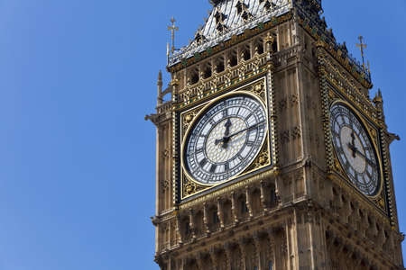 Close up of the clock face on the famous landmark clock tower known as Big Ben in London, England. Part of the Palace of Westminster also known as the Houses of Parliament, Big Ben is actually the name of the Bell inside the tower.の写真素材
