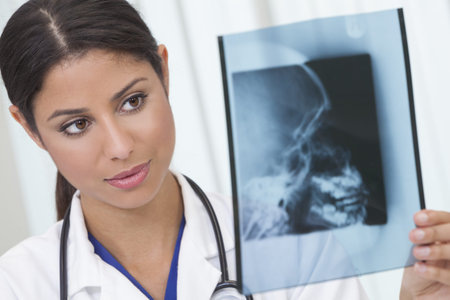 Female woman medical doctor holding x-ray in hospital