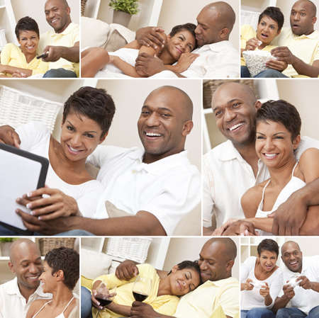 A happy African American man and woman couple in their thirties sitting at home, relaxing, drinking wine, playing video games and watching televisionの写真素材